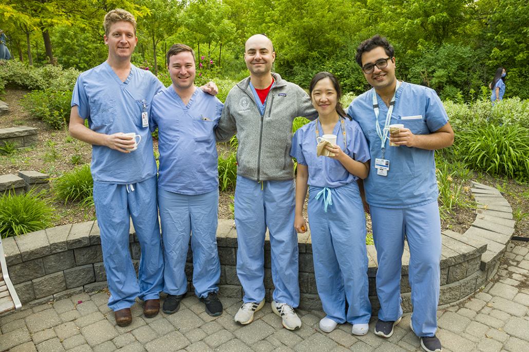 NYGH staff pose with reusable cups 